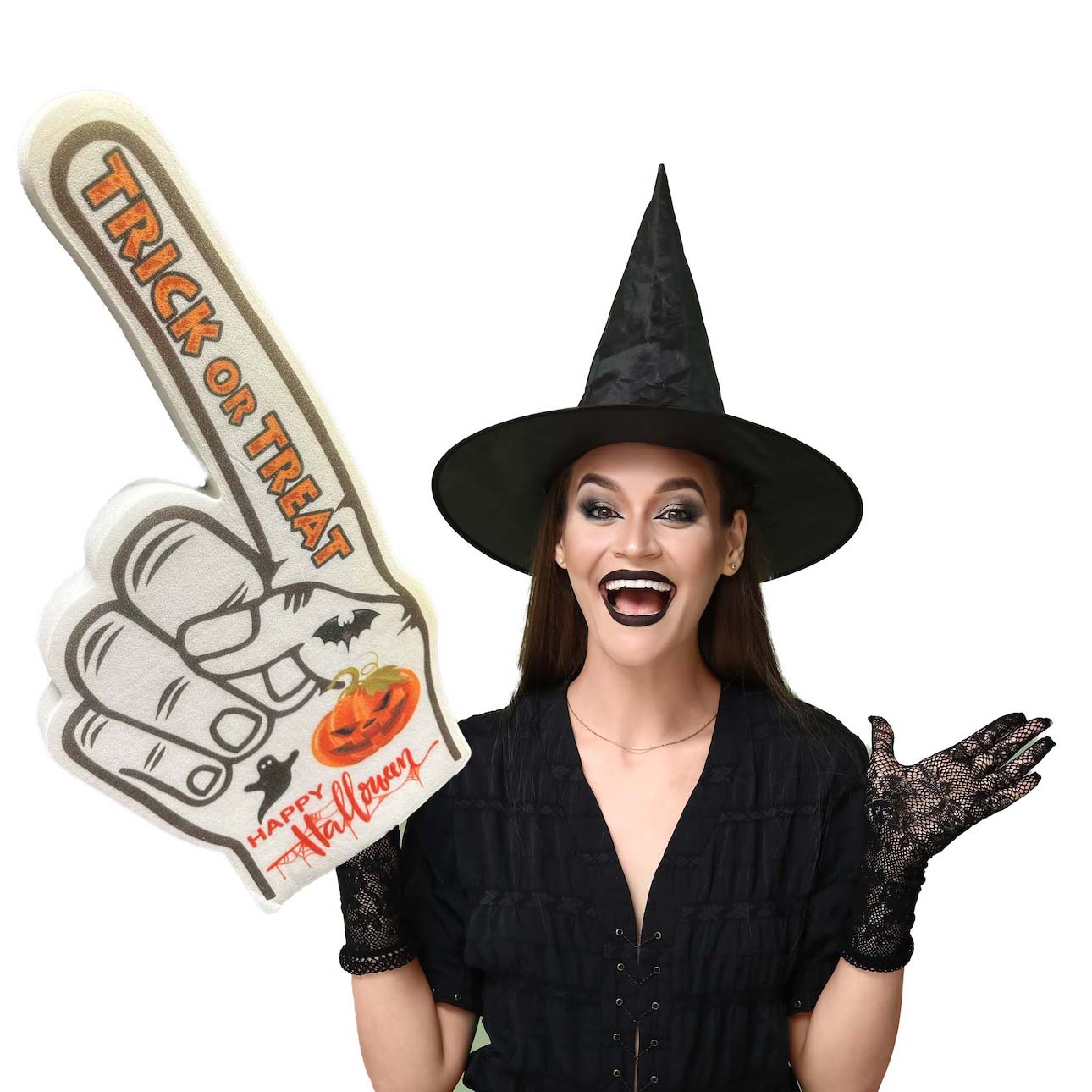 A person wearing a black witch costume and holding a white foam hand with 'Trick or Treat' printed on it, also with a pumpkin and bat design.